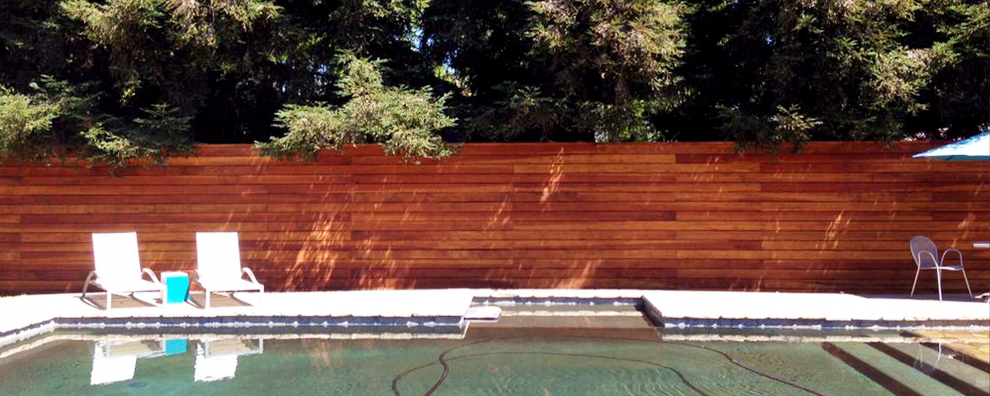 Horizontal redwood pool fence