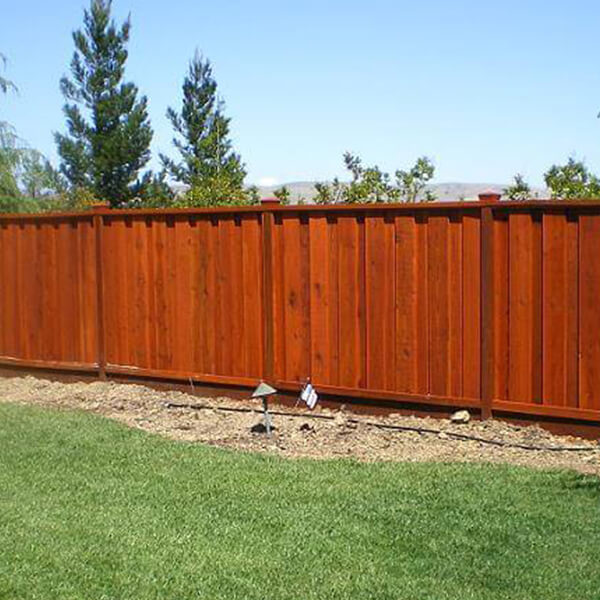 Thick redwood fence boards