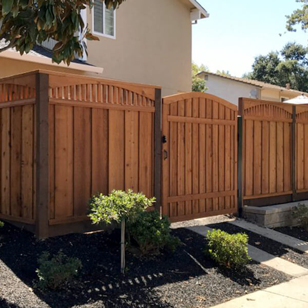 Stained redwood fence installation in Indiana 