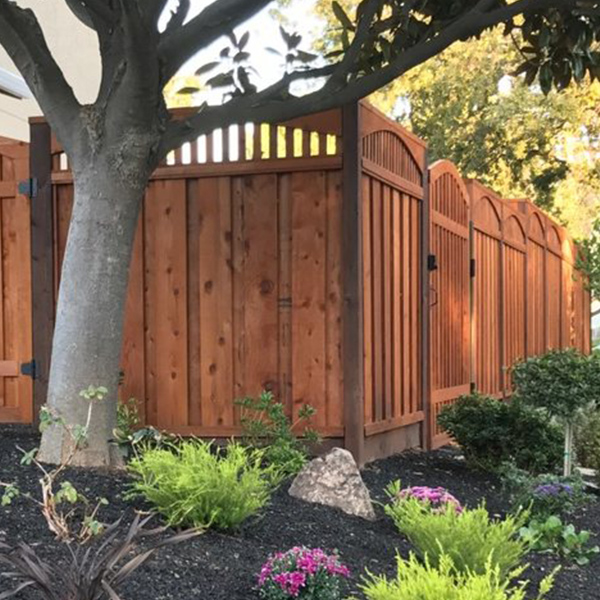 Decorative redwood fence with accent trim